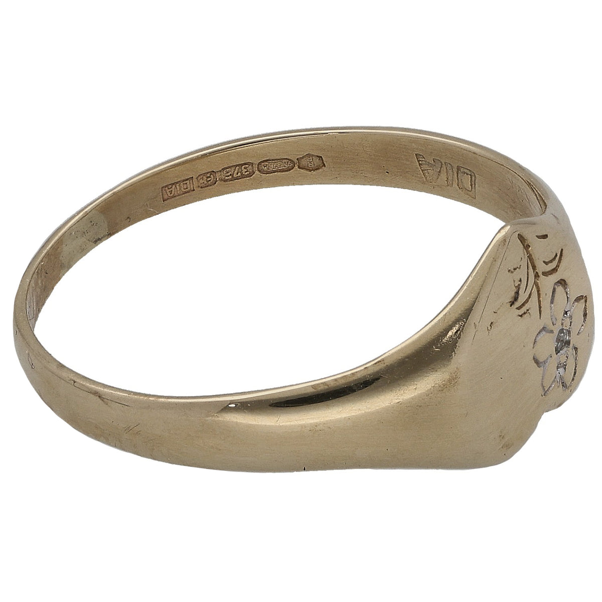 Gold signet ring band with inner hallmark stamps and engraved floral motif