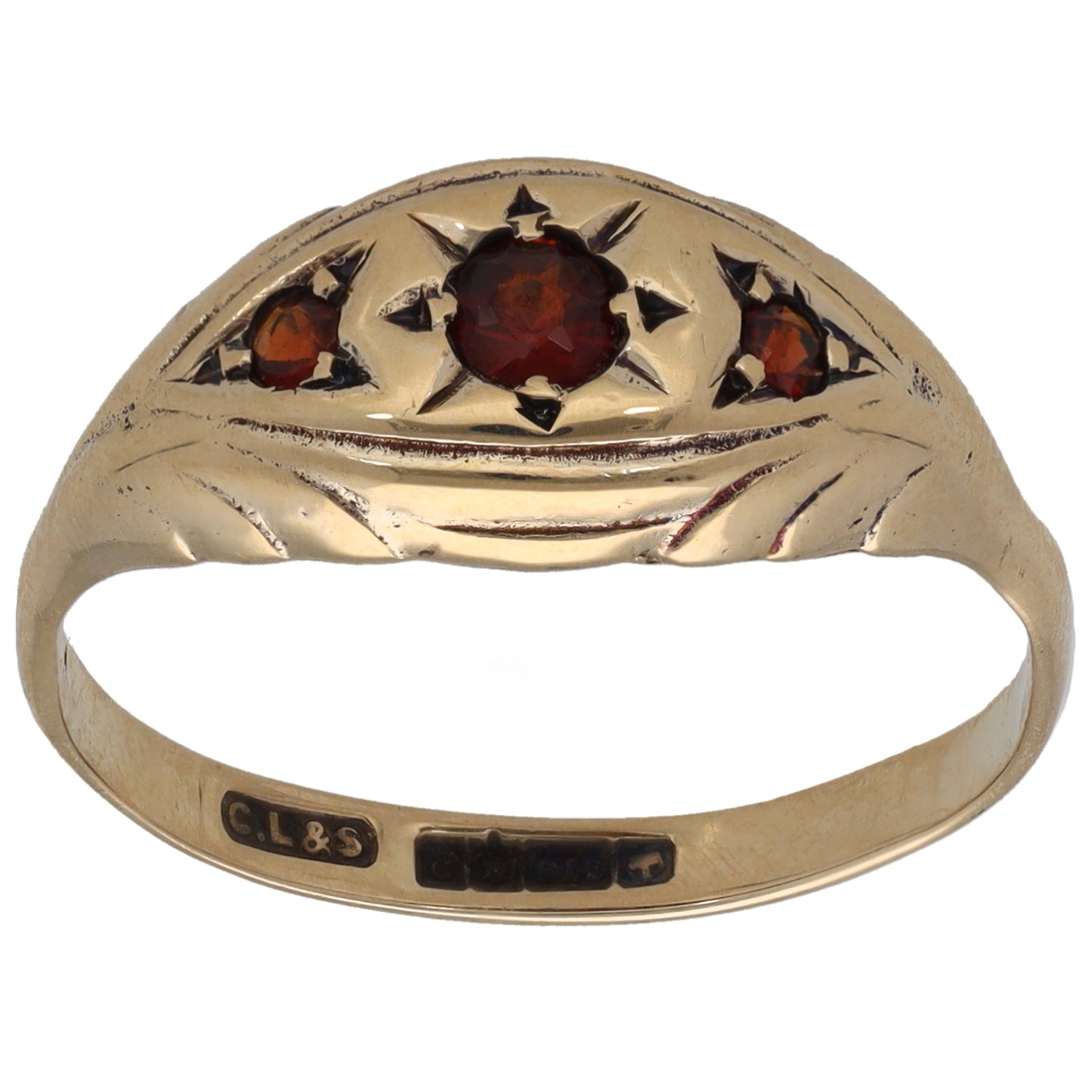 Gold three-stone ring with marquise garnets and star-like settings