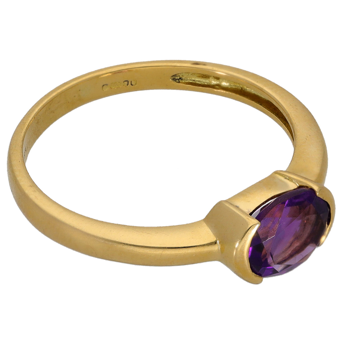 Gold ring with oval purple amethyst single stone in raised bezel setting