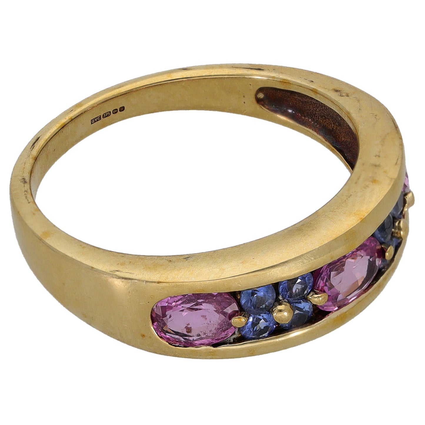 Gold-tone dress ring with oval pink center stone and blue side sapphires