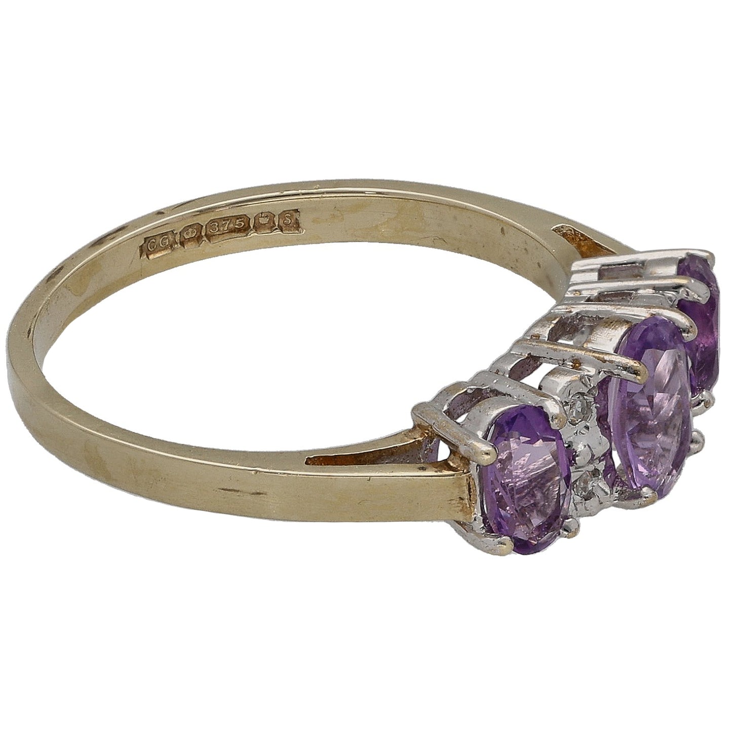 Gold amethyst & diamond ring with large center purple stone and two side stones