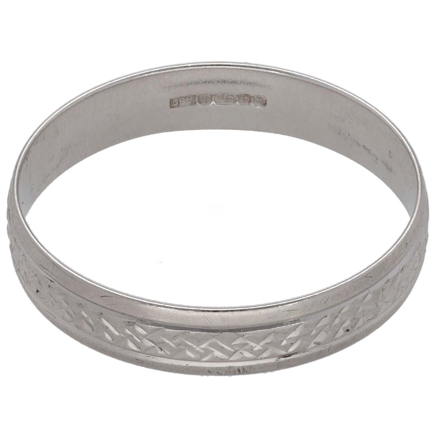 White gold wedding ring with diamond-cut pattern and stamped inner hallmark