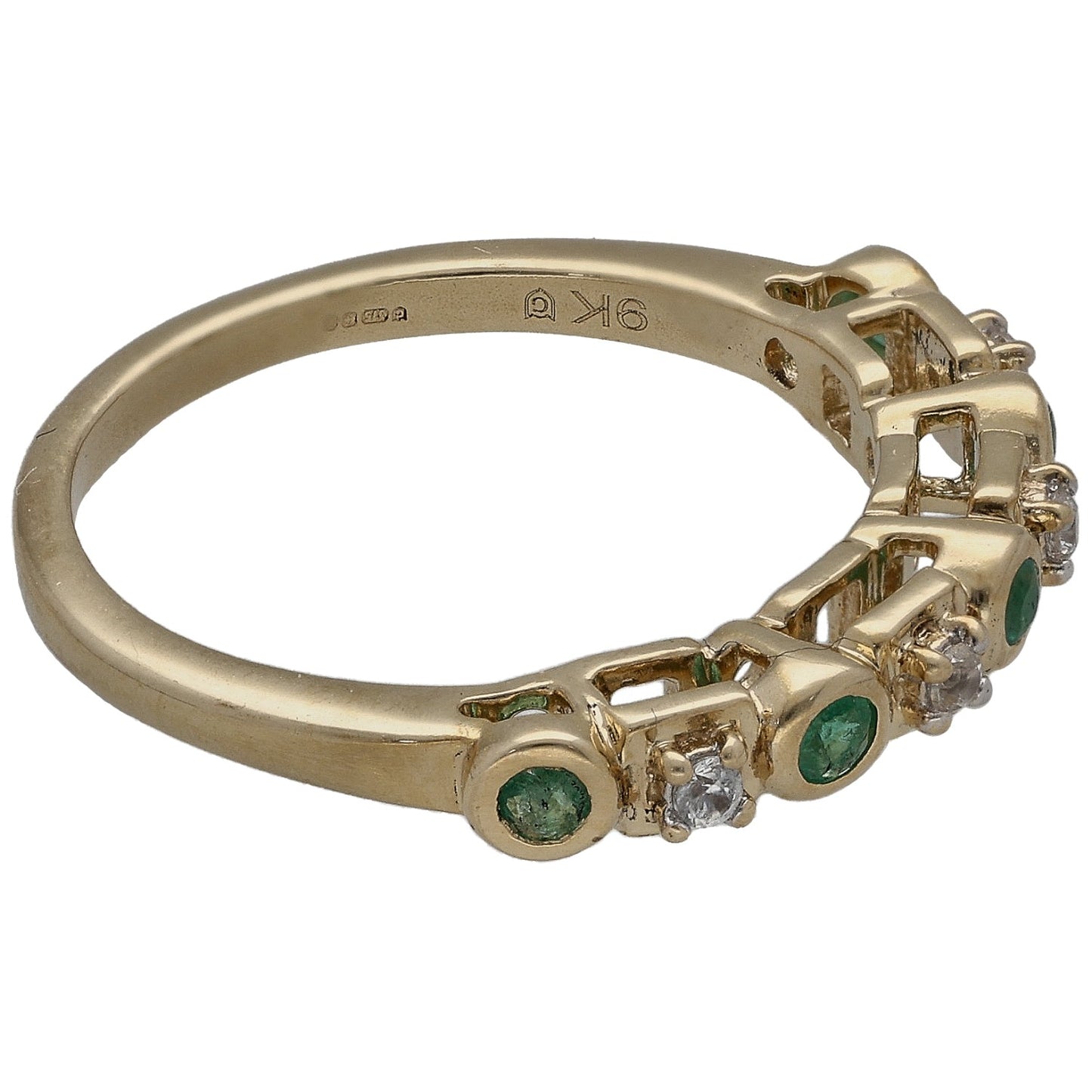 9ct gold ring side view with green oval emerald-look stones and clear stones, half-eternity