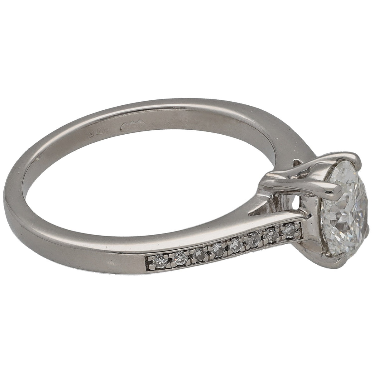 Platinum diamond solitaire ring, round center stone with pave side accents