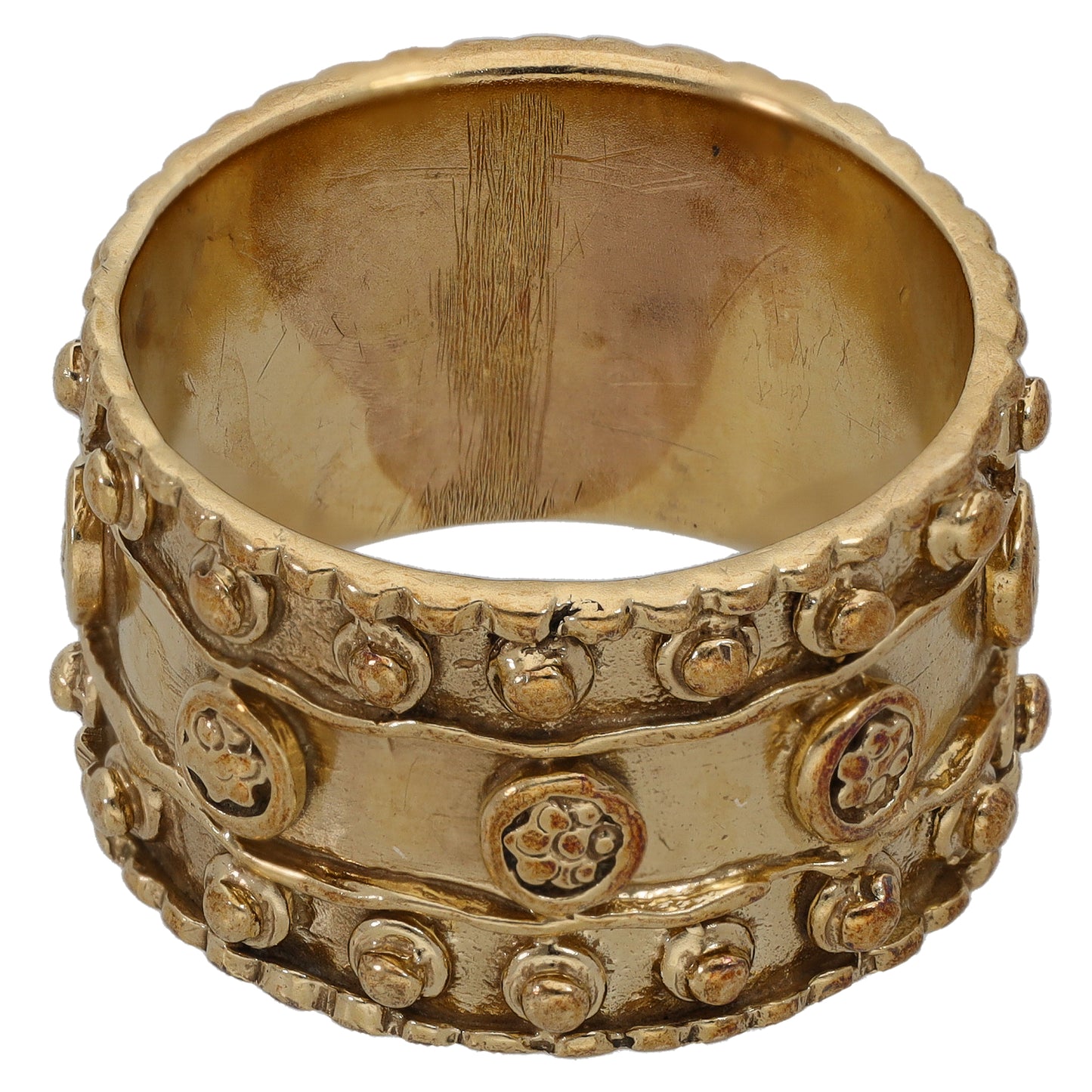 9ct gold wedding ring band with raised circular pattern around the outer edge, side view