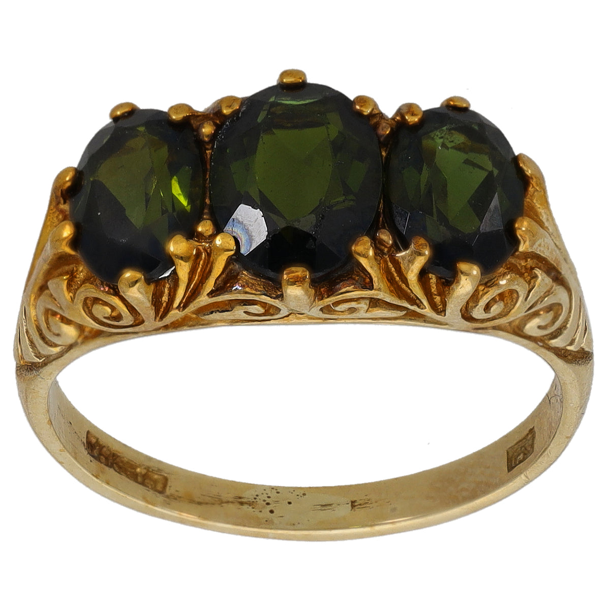 Gold three-stone ring, front view, three dark green oval gemstones in crown setting