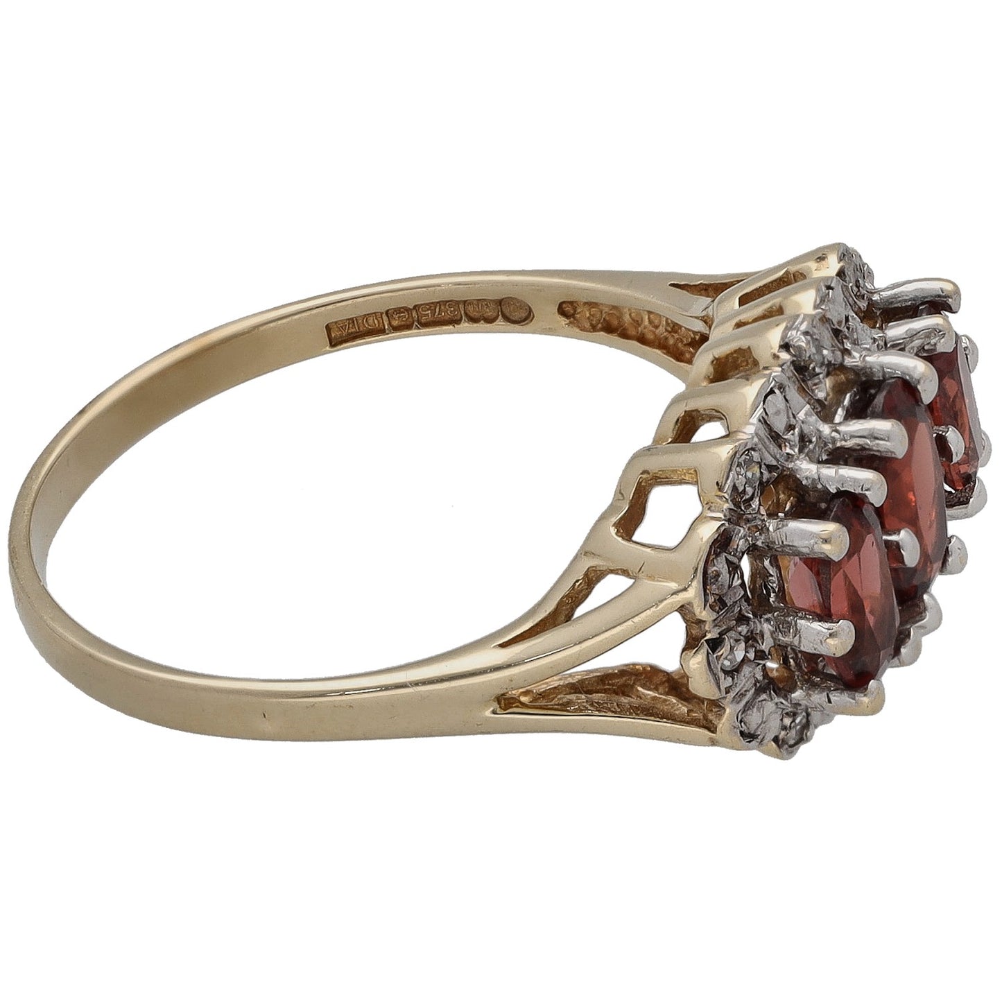 Side view of gold ring with red garnet marquise cluster and diamond halo prongs