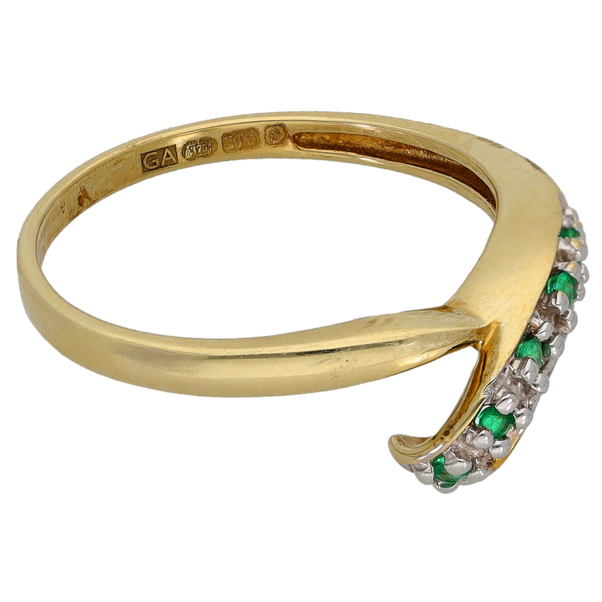 9ct gold ring with green gemstones and clear stones on a curved band
