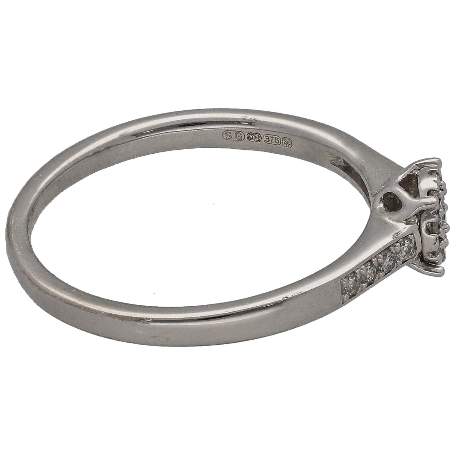 9ct white gold diamond cluster ring, side view with round stones and hallmark inside