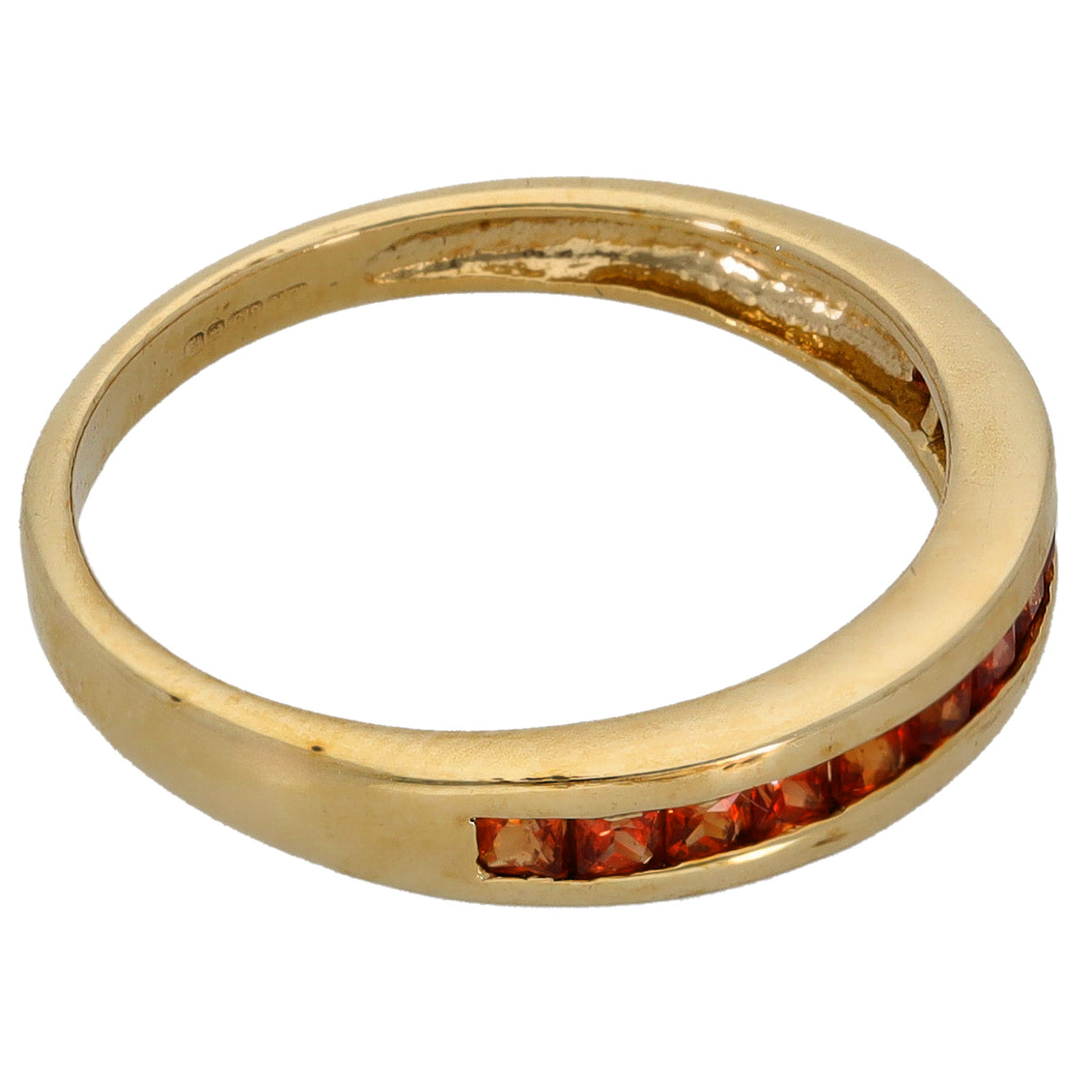 9ct gold half-eternity ring profile with red gemstones set along one side
