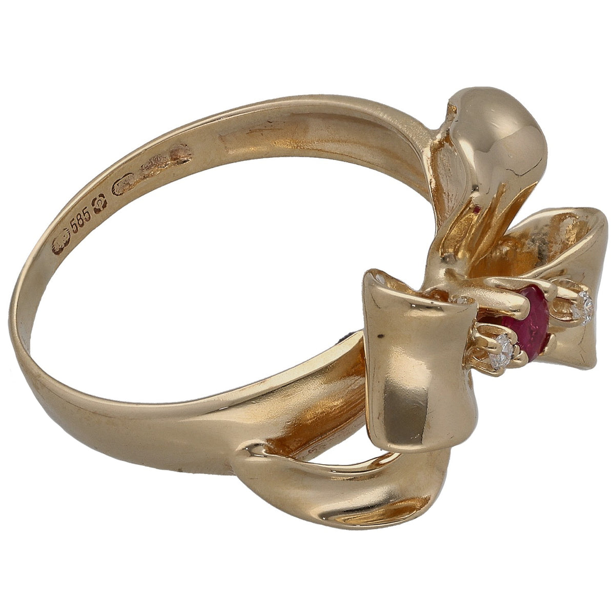 Gold ring angled view with ruby center gem and diamond side stones, 585 stamp