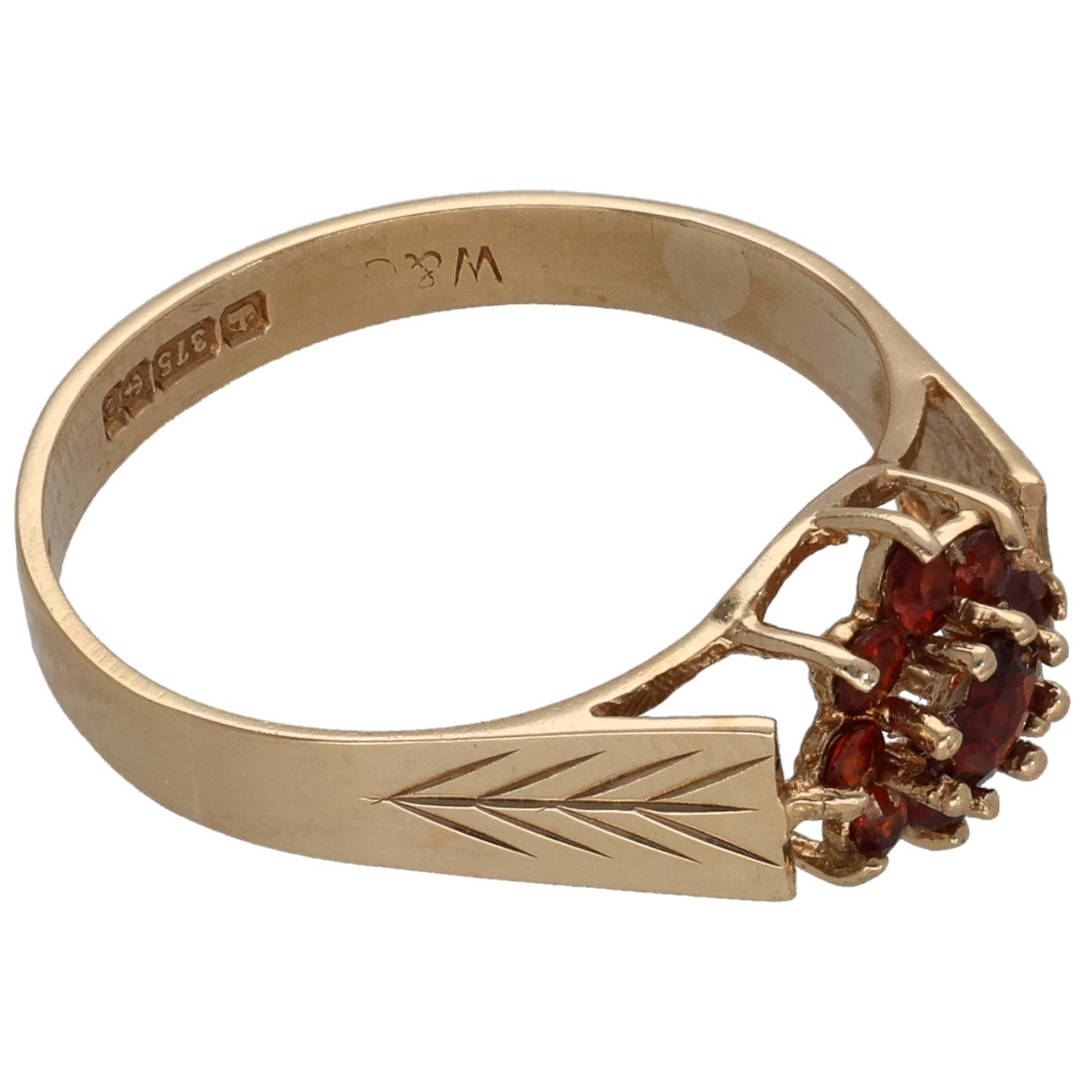 9ct gold garnet cocktail ring, side view with red gemstone cluster and geometric band etching