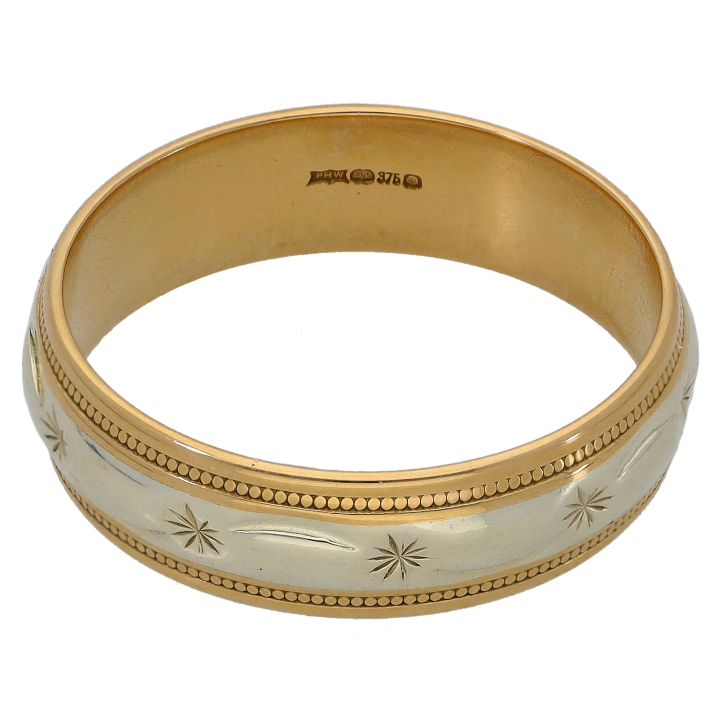 Two-tone gold wedding ring, hallmarked inside, with beaded border and starburst pattern