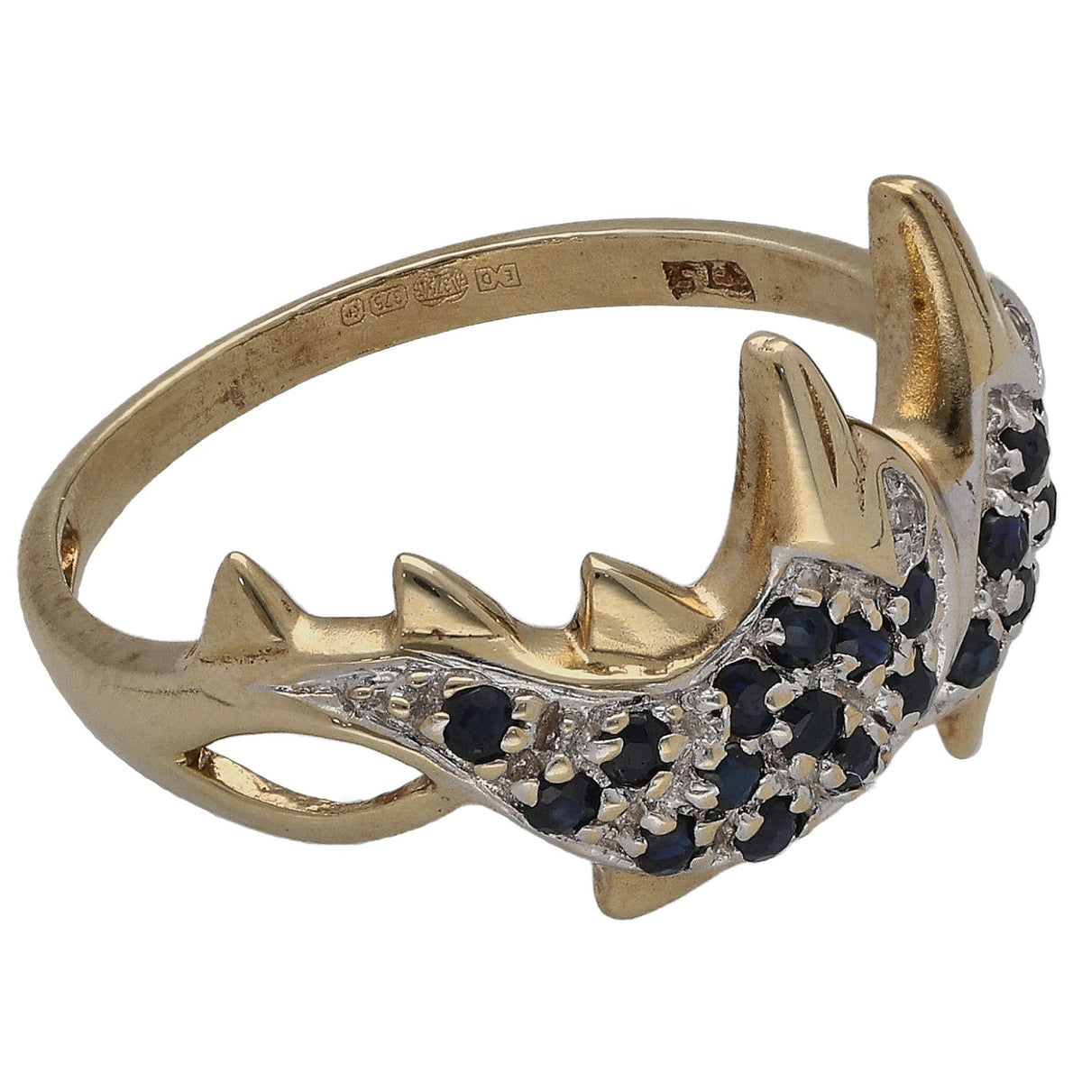 Gold-tone animal ring side profile with dark stone cluster and diamond highlights