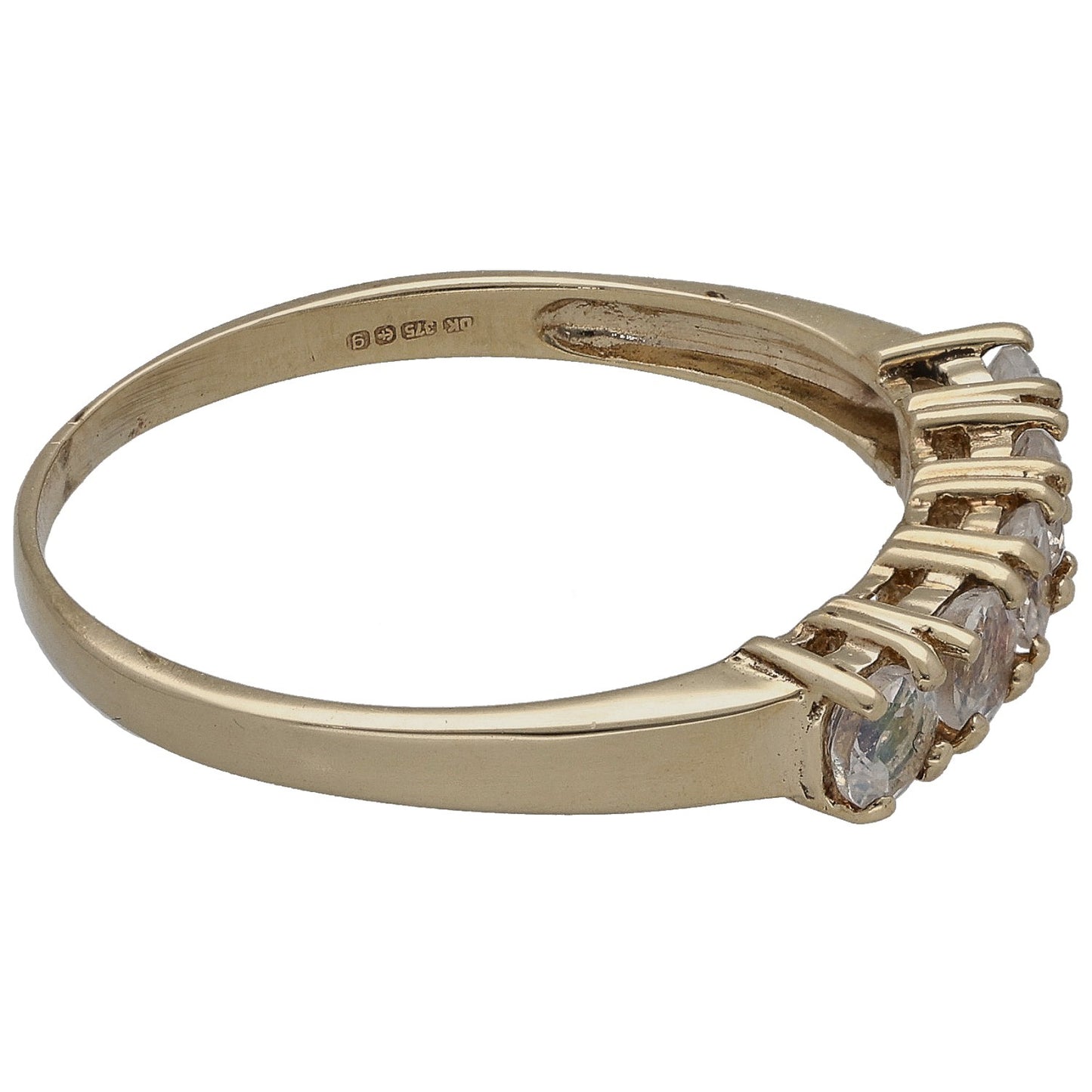 Gold-tone ring band with side view of faceted quartz half-eternity setting