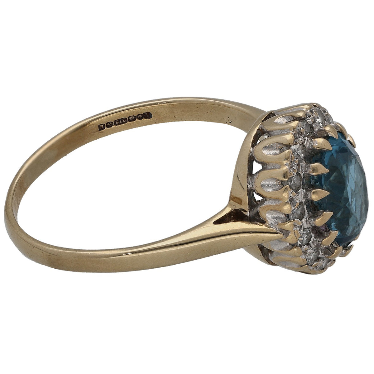 9ct gold ring showing side view: round blue topaz with diamond halo border