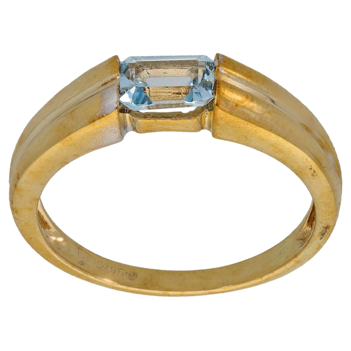 9ct gold ring with single light-blue topaz, rectangular faceted gemstone set on band
