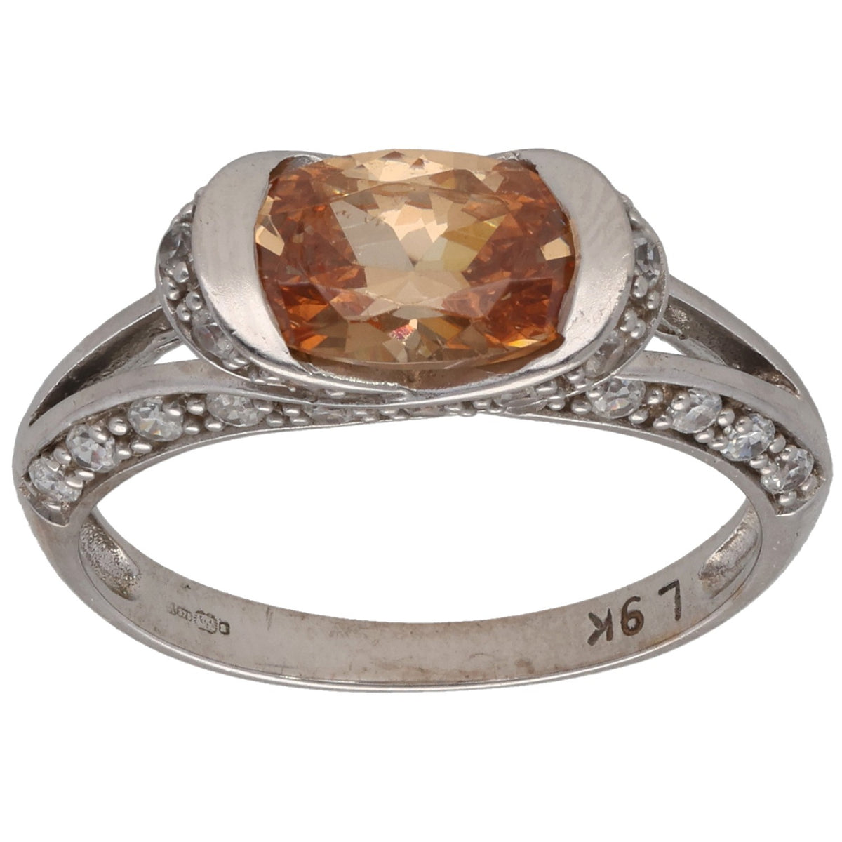 9ct white gold cocktail ring with orange CZ and pavé side stones, size N