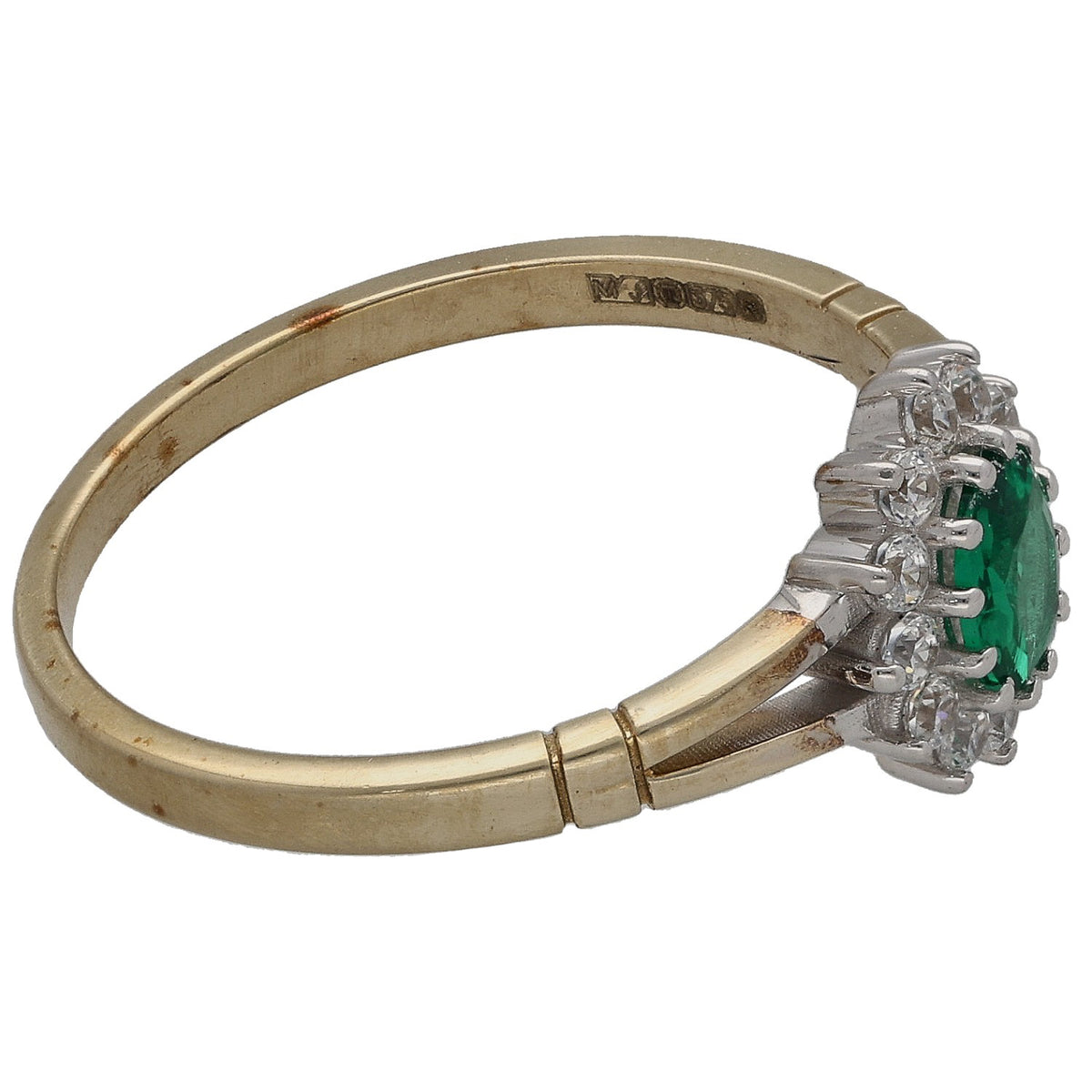 Gold-tone imitation ring, side view: green center stone with clear cluster accents