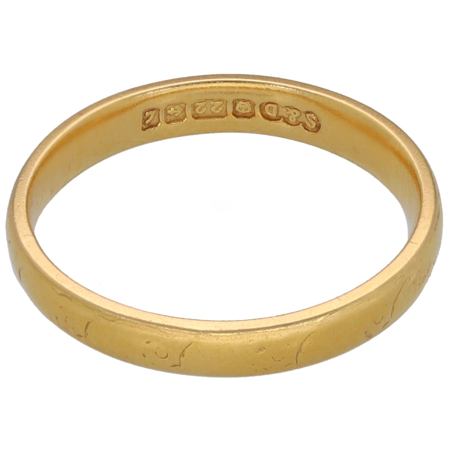 22ct gold wedding ring with patterned inner markings, smooth band exterior