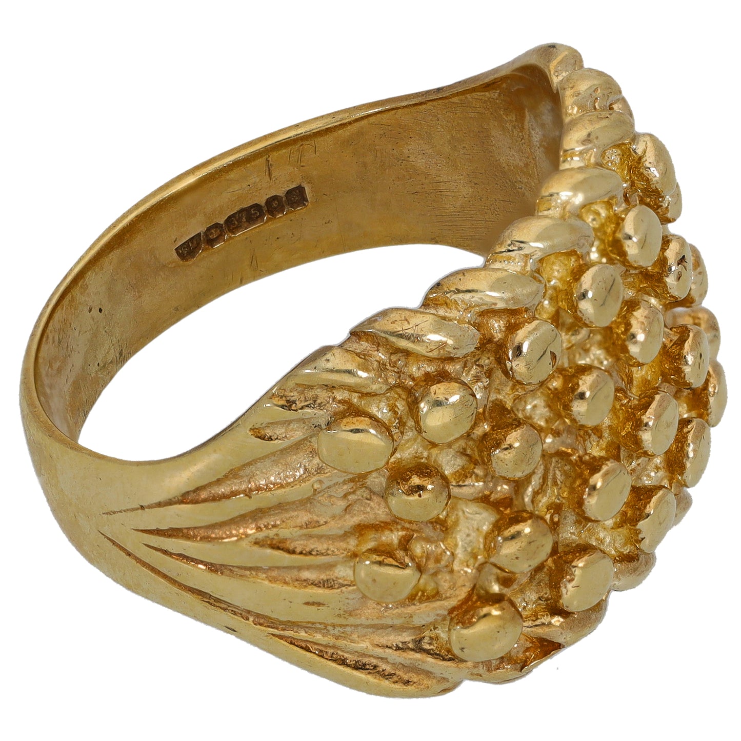 Gold keeper ring with raised dome cluster and decorative side profile