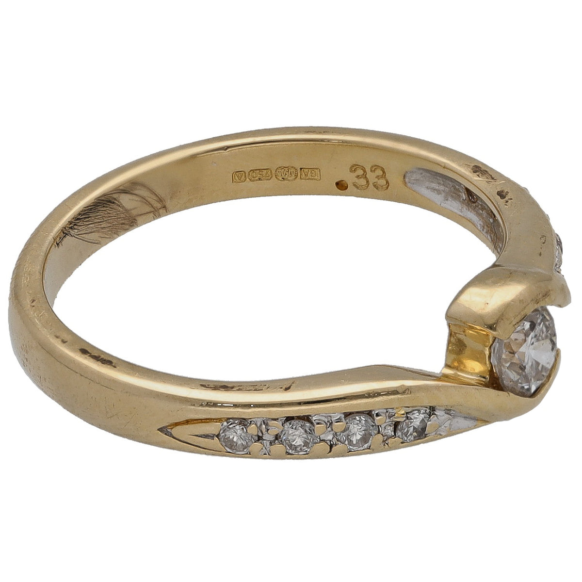 Gold ring with round center diamond, row of accent stones, and inner hallmark
