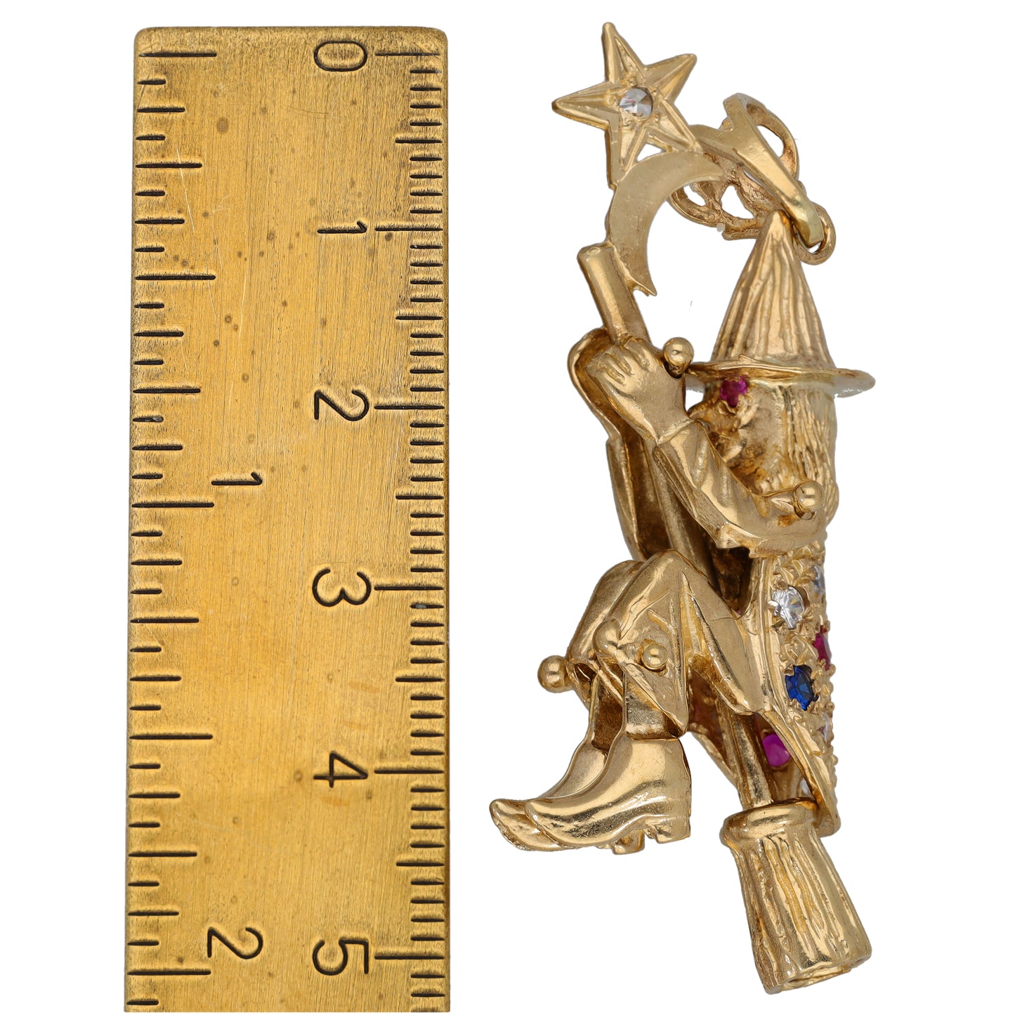 Gold-tone clown/doll character pendant with star, colorful crystals, and gift scale view