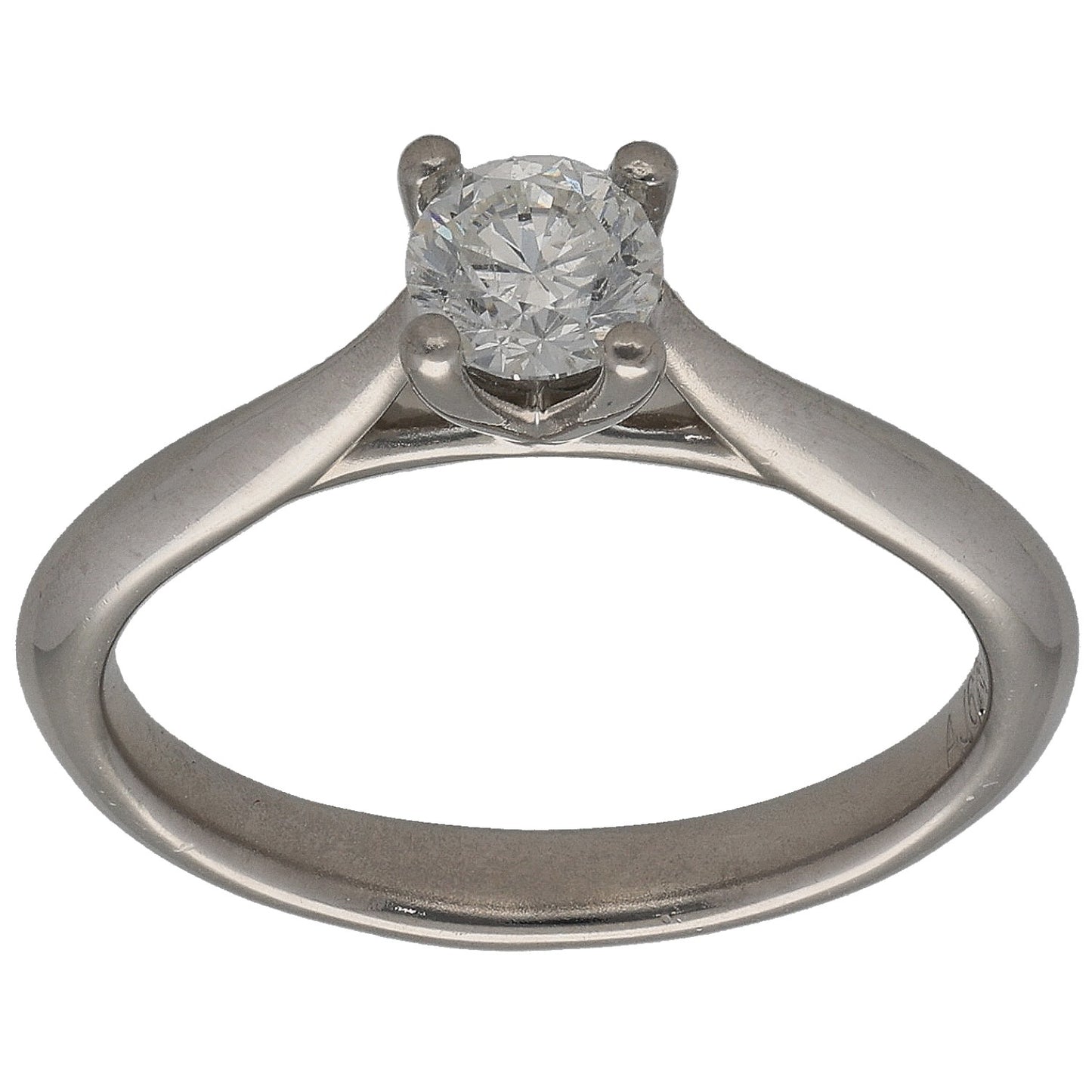Platinum round diamond solitaire ring with four-prong setting