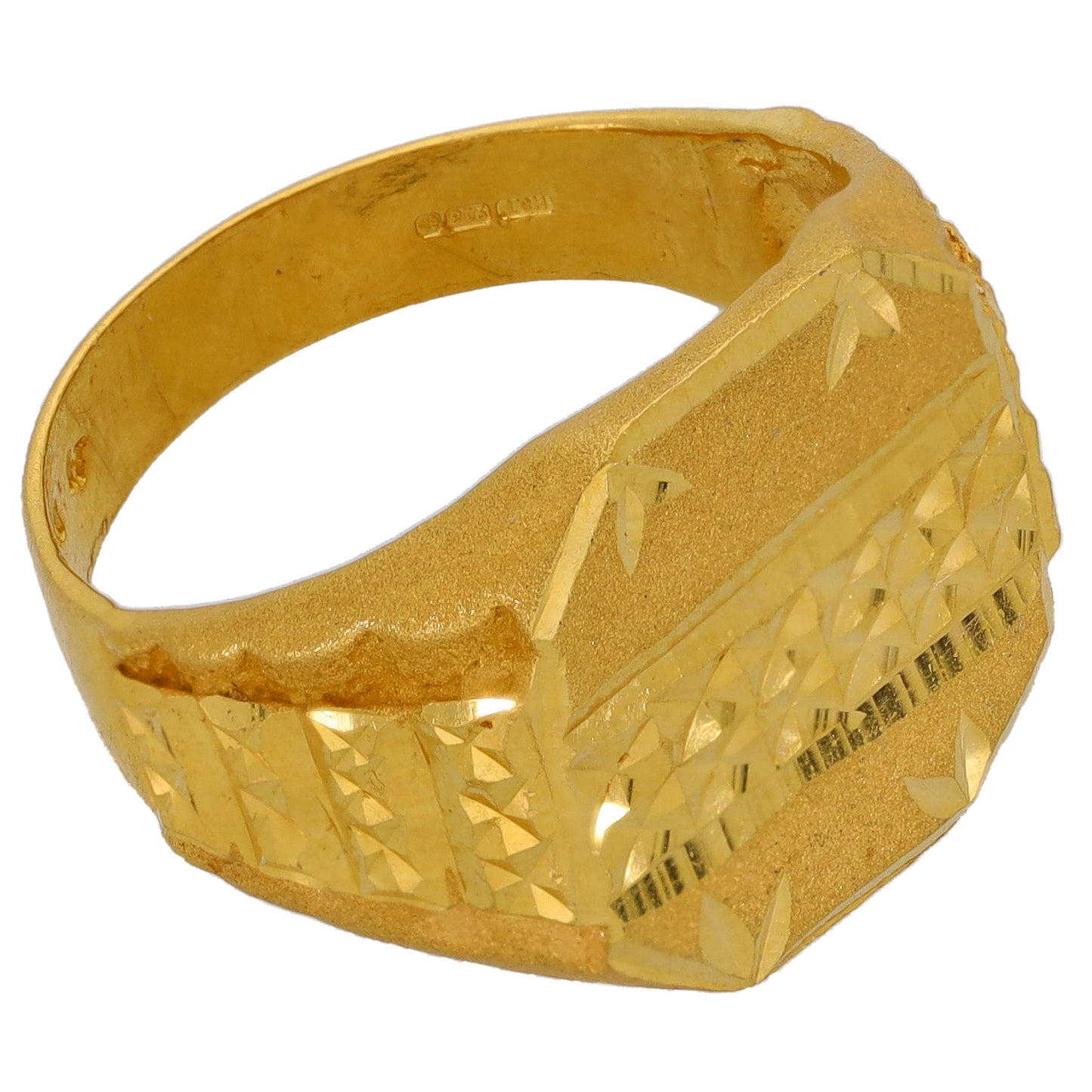 Gold signet ring with faceted patterned top and engraved inner band