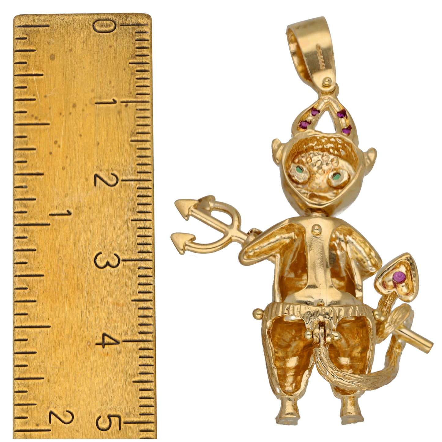 Gold-tone clown pendant side view with jeweled face, purple accents, and top bail loop