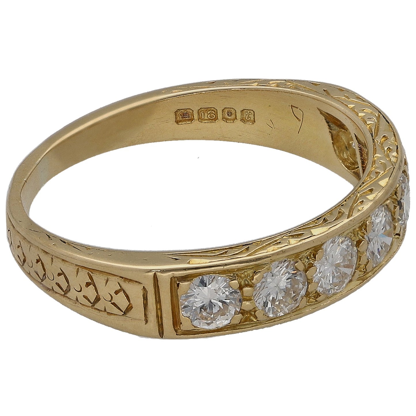 Gold half eternity ring with round diamonds along the curved band, side view