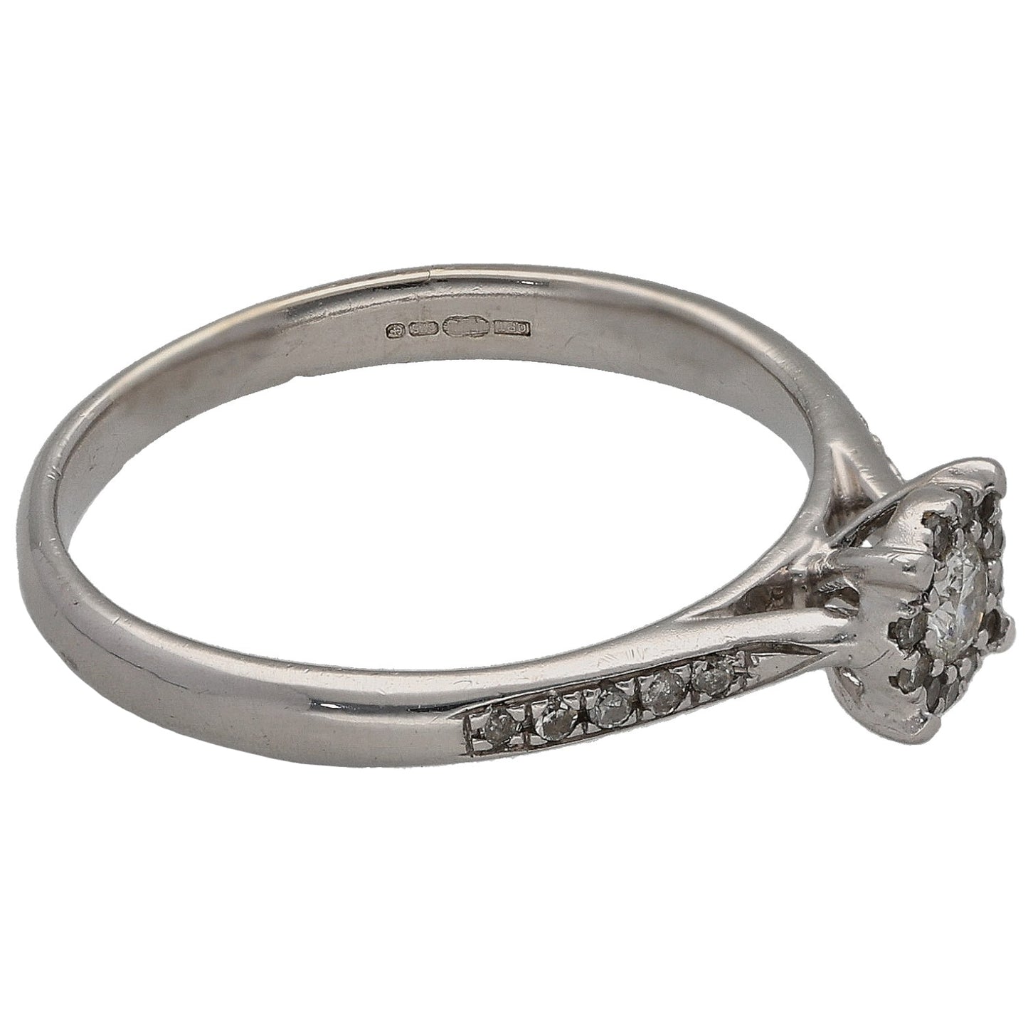 White gold diamond cluster ring with round side stones