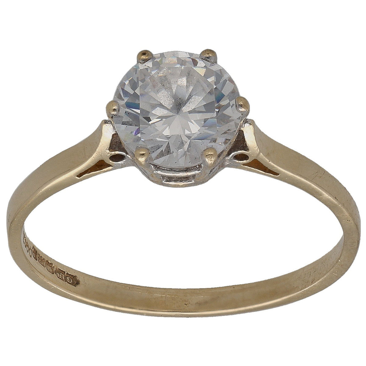 Gold-tone ring with round clear CZ center stone and four prong setting
