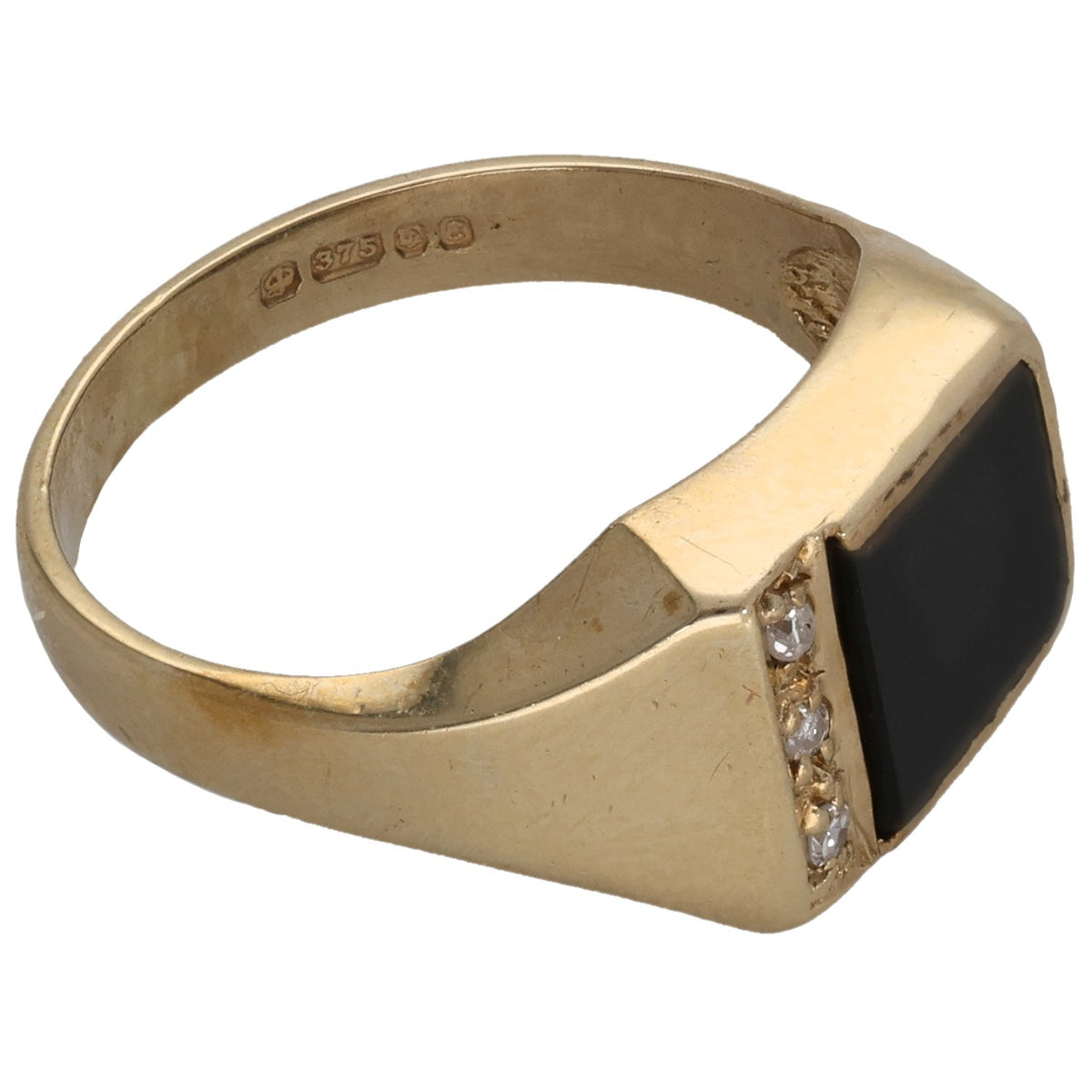 Gold signet ring angled view with black onyx inset and diamond row along the side