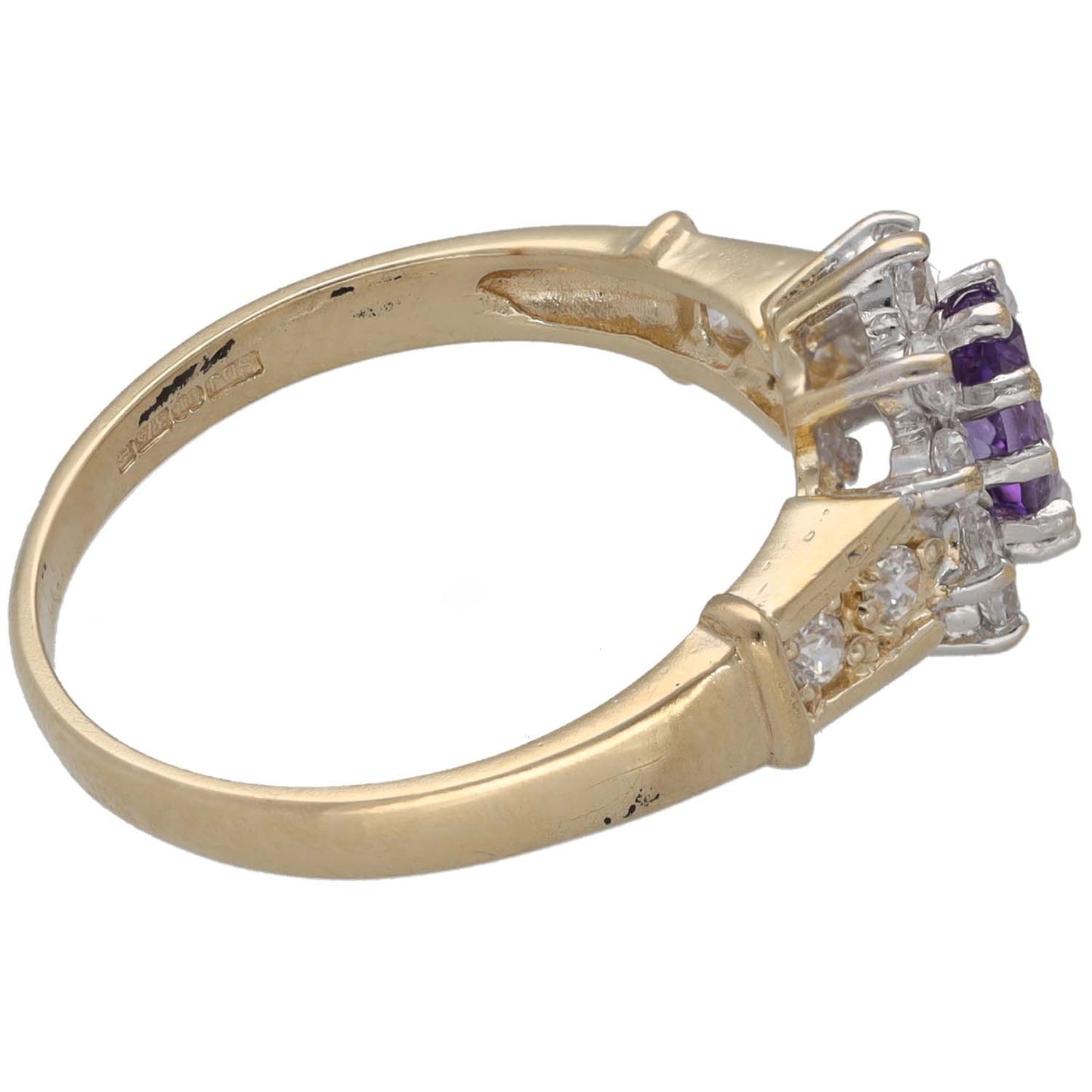 Gold ring side view with purple amethyst and white CZ prong setting
