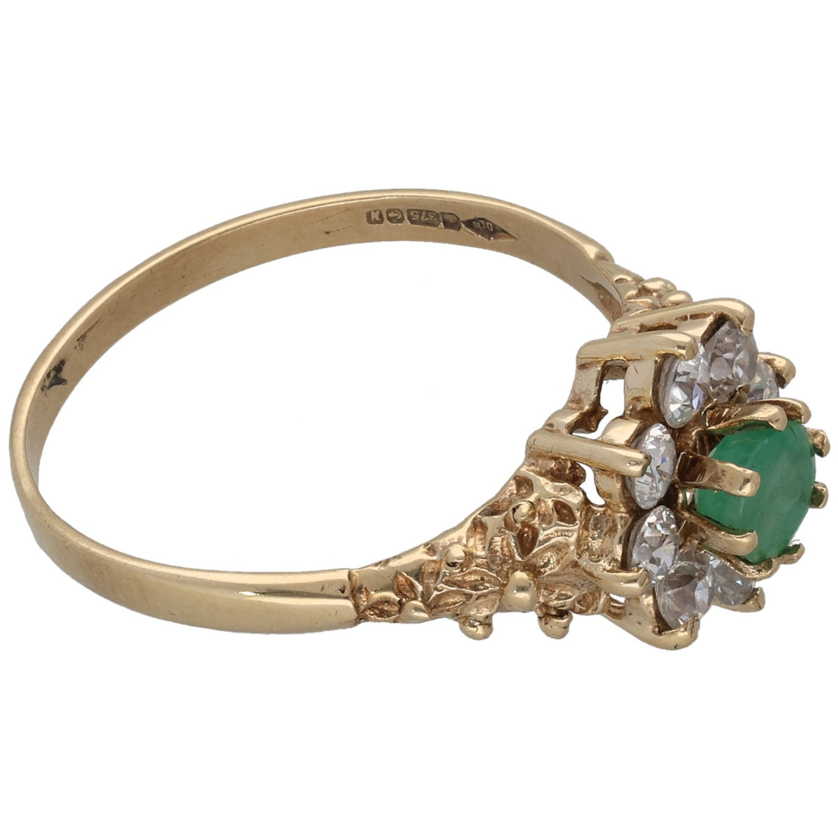 9ct gold ring band with side view of green oval emerald and round CZ clusters