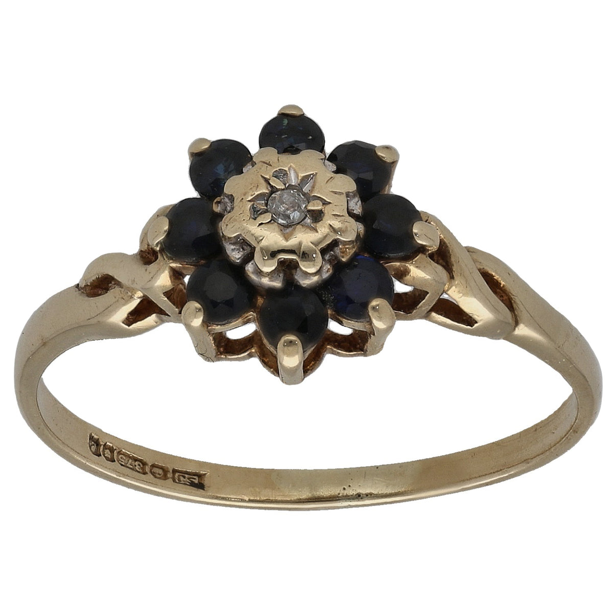 9ct gold sapphire cluster ring with dark stones and center round diamond flower