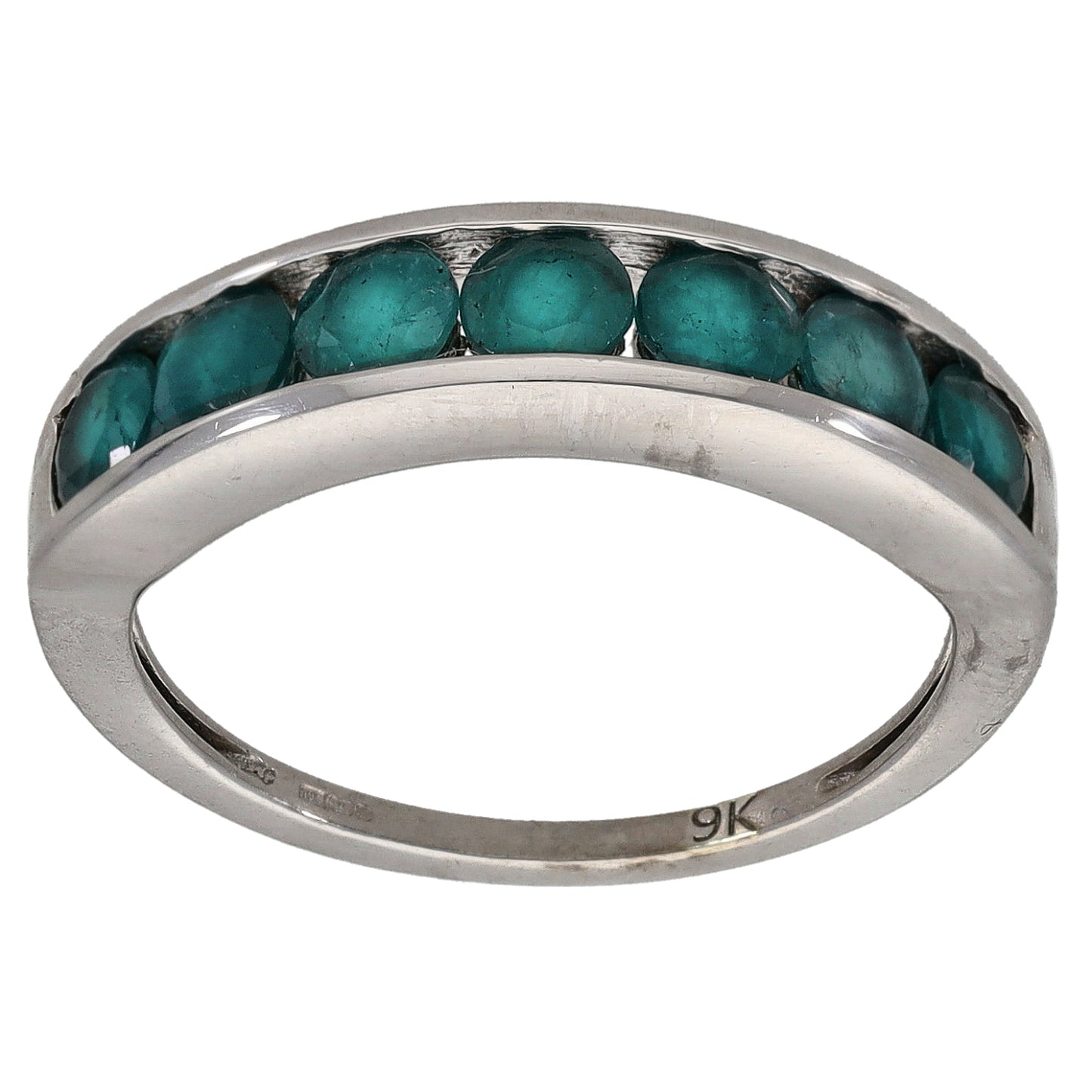 White gold half eternity ring with a row of teal gemstones across the top