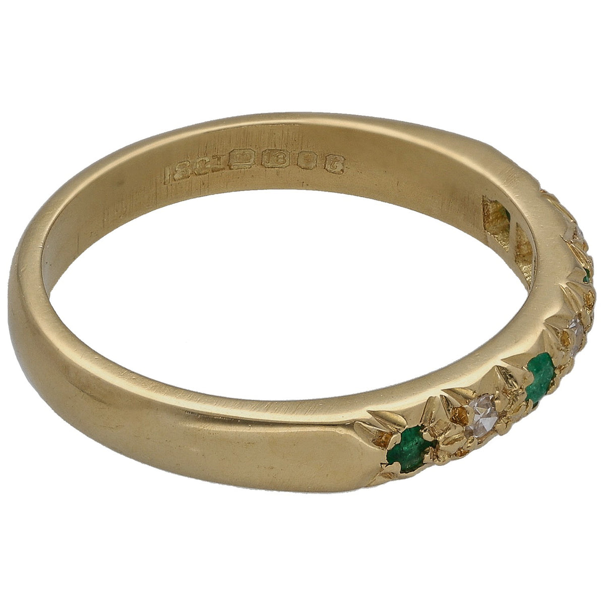 18ct gold half eternity ring with engraved inside band; emerald and diamond settings