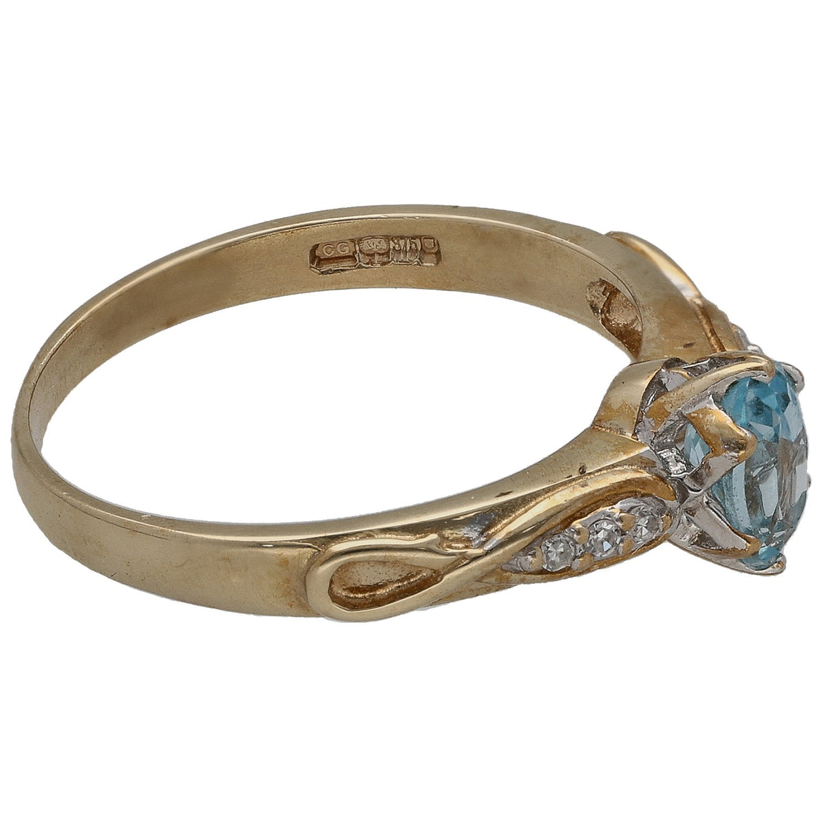 Gold ring angled view with oval blue gemstone and side round diamond accents