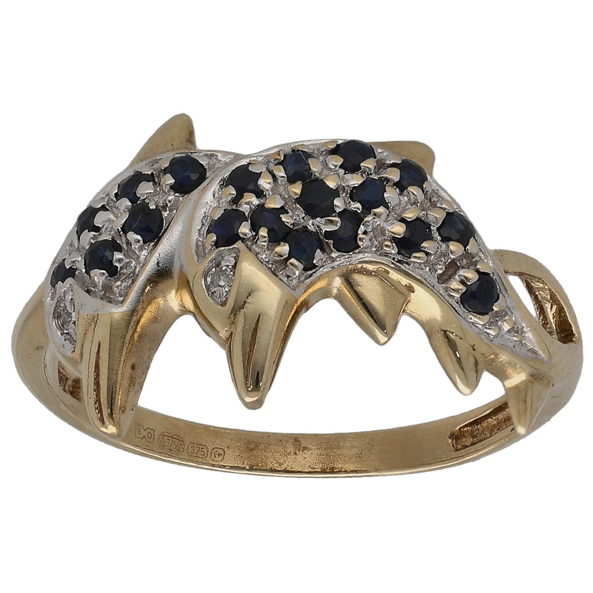 Gold-tone animal ring with dark cluster stones and clear diamond accents
