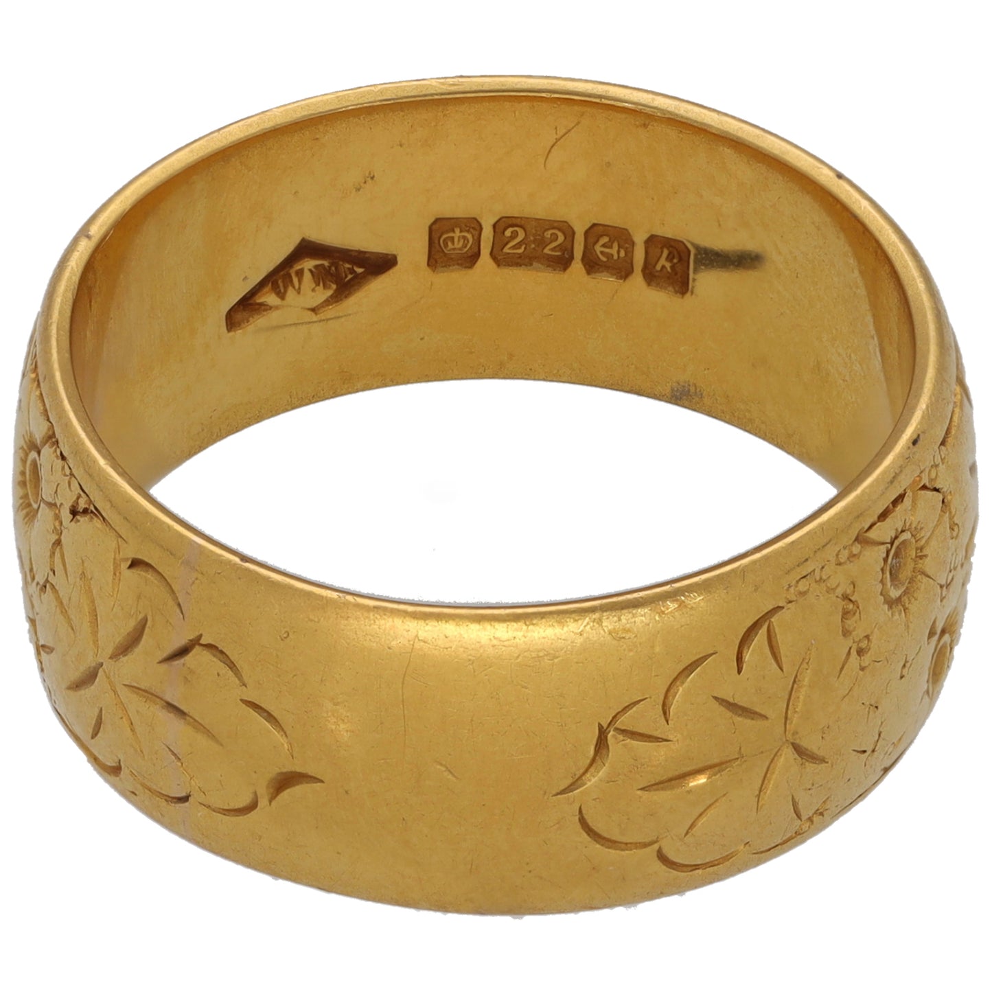 22ct gold wedding ring with engraved '22' stamp and leafy inner pattern