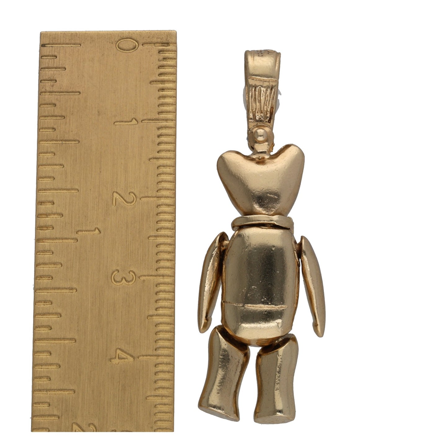 Gold-tone doll character pendant, side view with raised head and multicolor chest studs