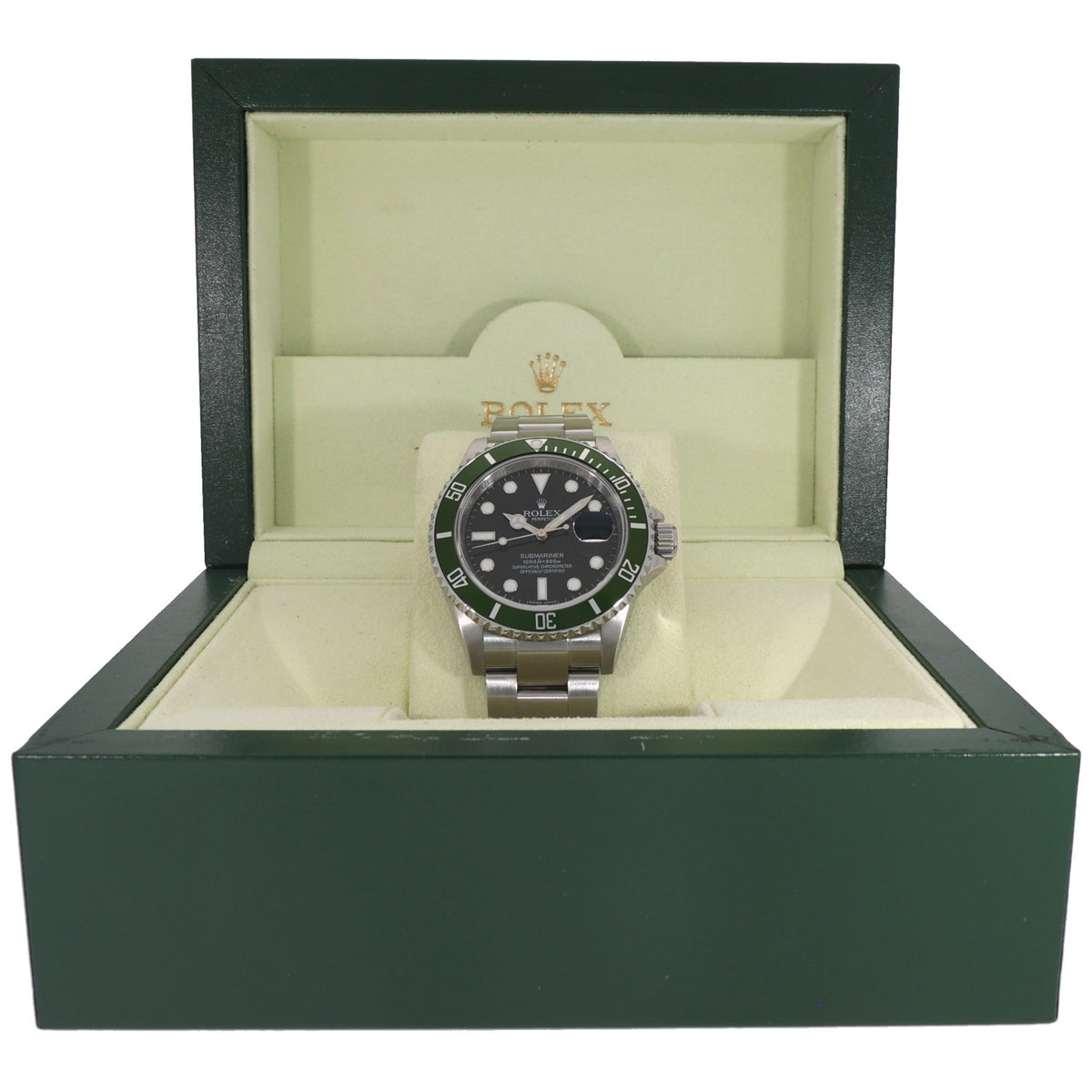 Stainless steel Submariner watch with green bezel and black dial, in display box