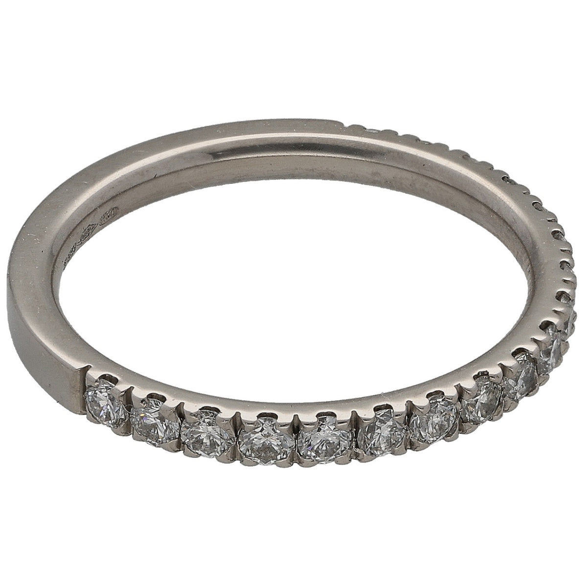 Platinum half eternity diamond ring, round-cut stones along the band, side view