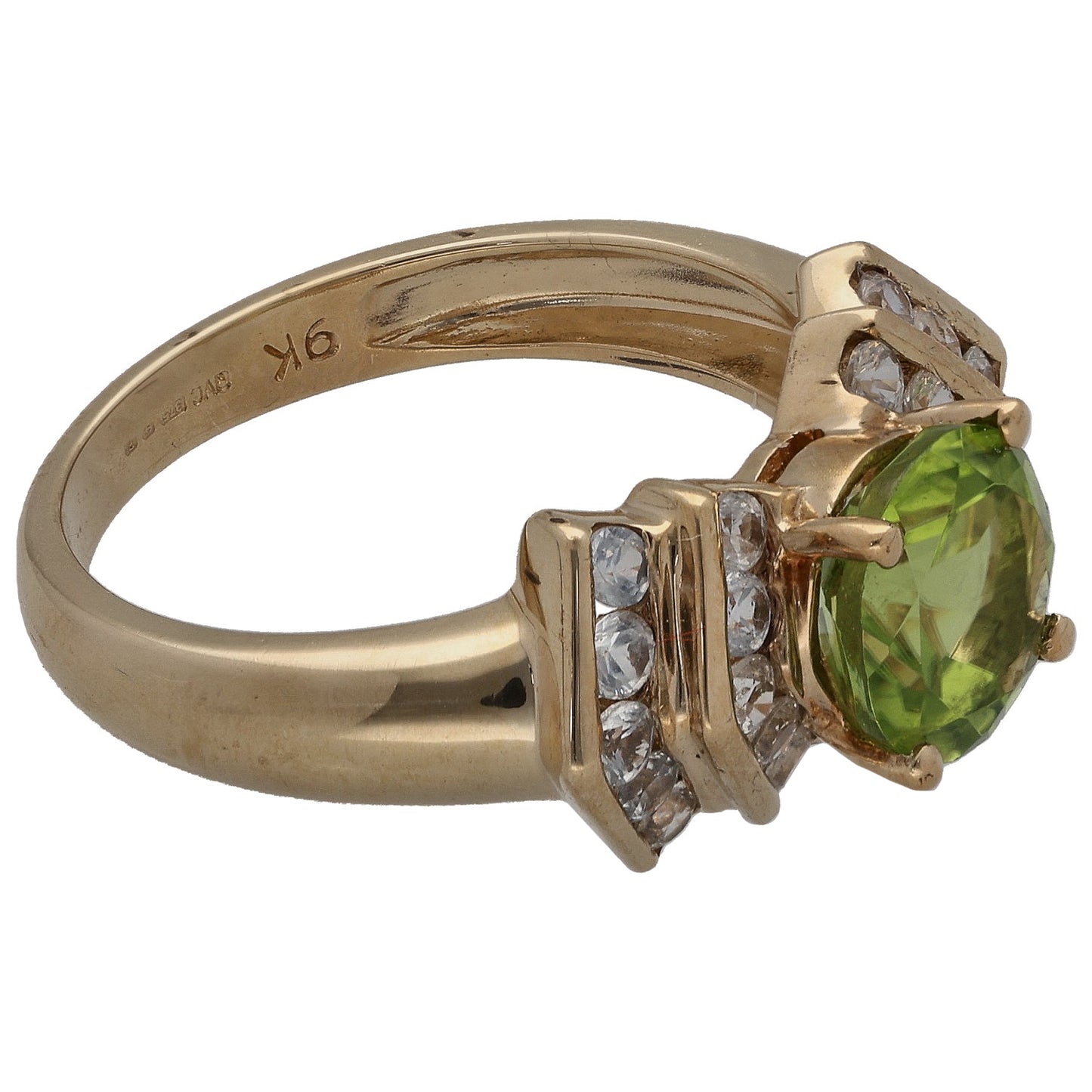 9ct gold ring with green oval center stone and three clear stones on raised setting