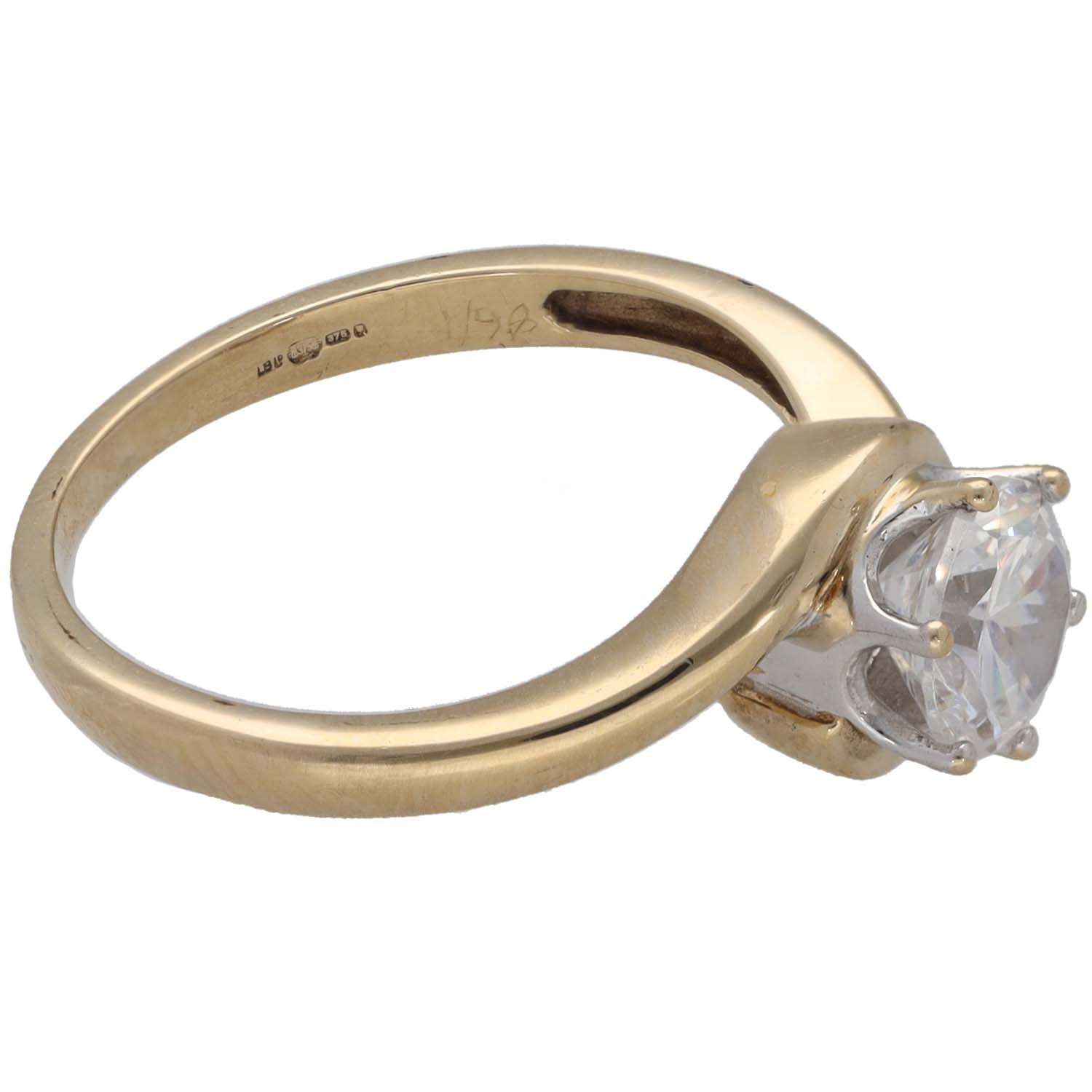 9ct gold ring with round CZ single-stone set in four-prong bezel, side view