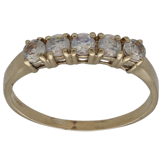 Gold-tone half eternity ring with faceted clear quartz stones across top