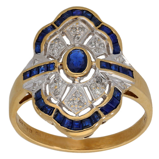 9ct gold ring front view: round blue sapphire, blue stones, diamond cluster