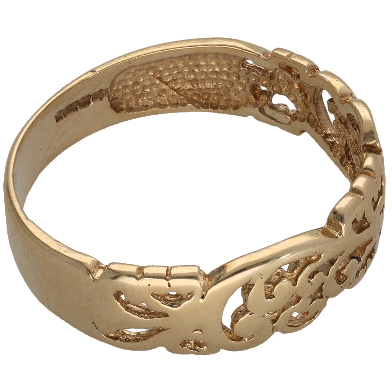 9ct gold wedding ring with textured engraved pattern and raised motif details